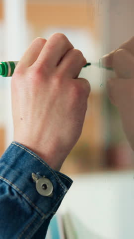 Glass, writing and planning in office, hands and brainstorming for brand awareness, ideas and notes. Marketing manager, strategy and person with research for project, info and creative for campaign