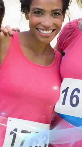 Animation of pink ribbon logo and blue wave over diverse group of smiling women. breast cancer positive awareness campaign concept digitally generated video.