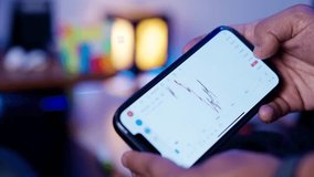 Finger Interacting with Digital Stock Market Data on Phone - Powered by Shutterstock - Get 15% off with code: PIKWIZARD15