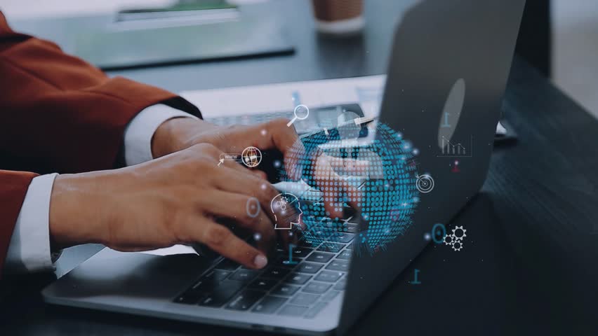 Business professional working on laptop with digital hologram interface, global network and data technology, innovative fintech and cybersecurity background modern communication and online connection - Powered by Shutterstock - Get 15% off with code: PIKWIZARD15