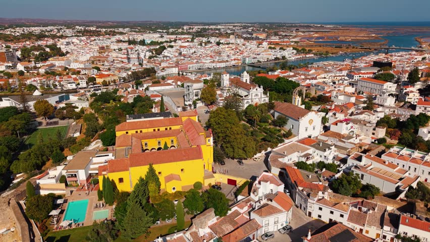 Aerial shot over the historic town of Tavira with the castle, st Mary