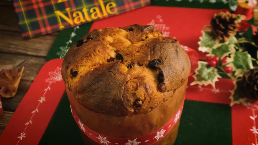  Discover Panettone, the iconic Italian Christmas cake. This soft, dome-shaped sweet bread is filled with raisins and candied fruit, a true symbol of holiday joy.