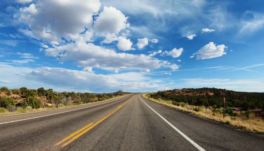Beautiful Summer Mountain Scenery with Car on Curved Forest Road