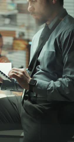 Man, detective and reading folder in office for investigation, forensic report and case evidence. People, documents and incident summary of crime scene, suspect statement and information on murder