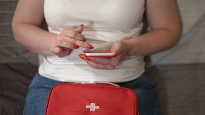 First aid kit. Use a smartphone. Slow motion. High quality 4k footage