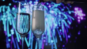 Pouring bubbly amidst festive fireworks, Clinking champagne glasses with fireworks in background - Powered by Shutterstock - Get 15% off with code: PIKWIZARD15