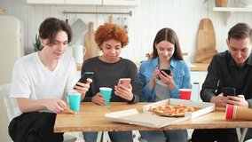 Home party. Friends holding smartphones touch screen typing scroll page in kitchen at home. People with cell phones surfing internet using social media apps on party. Internet news cellphone addiction - Powered by Shutterstock - Get 15% off with code: PIKWIZARD15