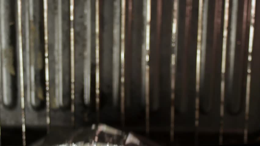 Vegetables into oven each vegetable seasoned with herbs for clean eating. Vegetables align in foil tray showing natural flavor and organic lifestyle. Vegetables and oven as part of vegetarian cooking.