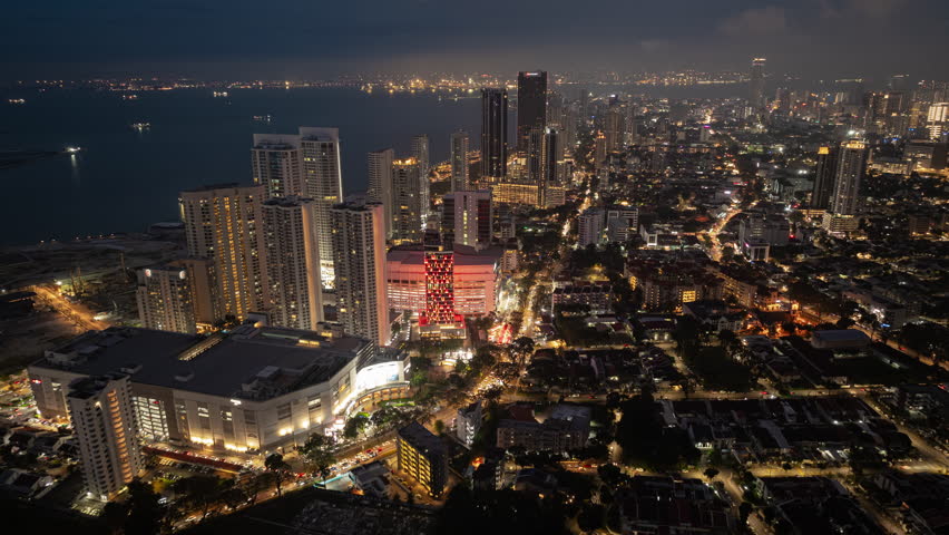 night time illumination penang island george town traffic bay downtown aerial panorama 4k timelapse malaysia