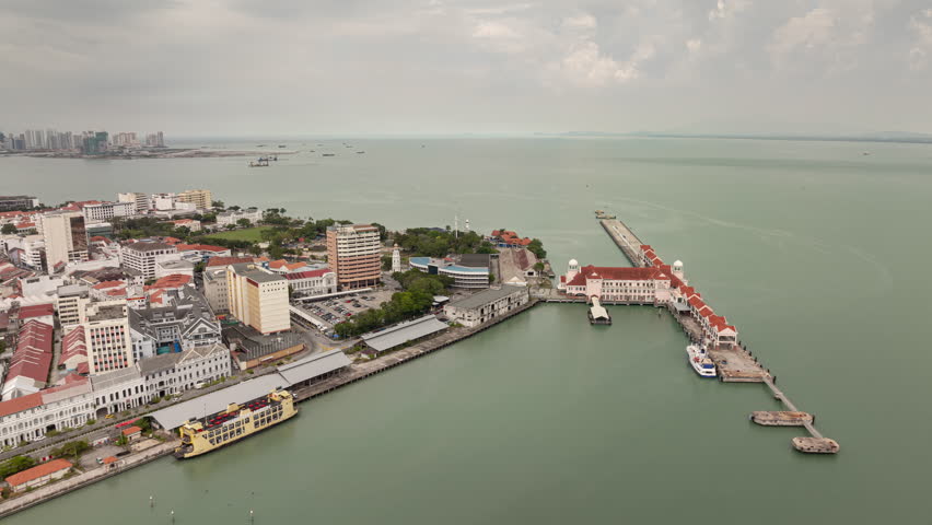 day time penang island george town famous bay pier aerial panorama 4k timelapse malaysia