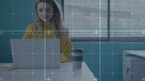 Office worker typing on laptop and spawning gridlines before jotting planning notes on sticky notes. Workspace, productivity, modern, professional, digital, creative, concentration - Powered by Shutterstock - Get 15% off with code: PIKWIZARD15