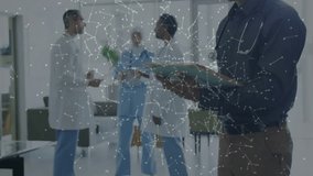 Medical team observing tablet, shimmering particles forming cloud gears for digital transformation. Healthcare, teamwork, technology, innovation, collaboration, digital, modern - Powered by Shutterstock - Get 15% off with code: PIKWIZARD15