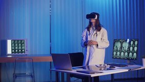 Doctor in White Coat Interacts With Virtual Reality Interface to Study Brain MRI Scans. Concept of Medical Research, Advanced Diagnostics, and Healthcare Innovation Through VR Technology. - Powered by Shutterstock - Get 15% off with code: PIKWIZARD15