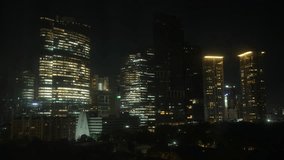 A stunning nighttime cityscape showcases a vibrant urban skyline adorned with twinkling lights - Powered by Shutterstock - Get 15% off with code: PIKWIZARD15