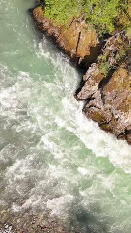 Powerful River Rapids in British Columbia, Canada: A Dynamic Natural Landscape