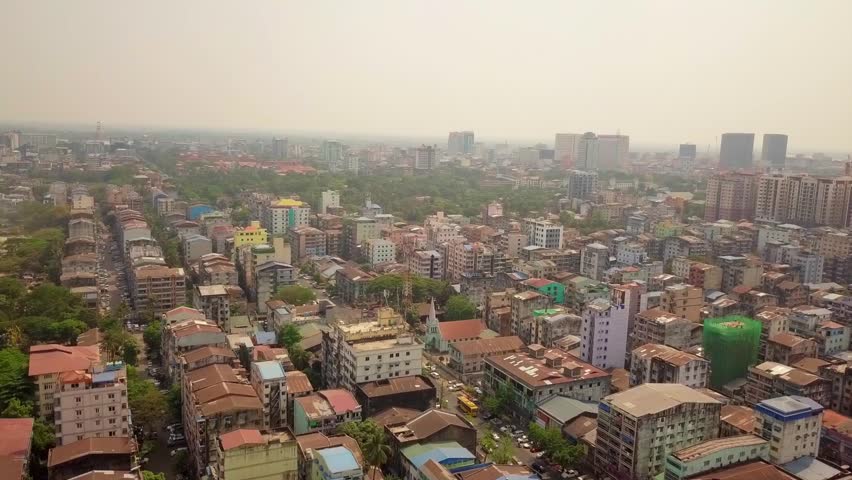  Futuristic aerial view panorama of developing Yangon city , Aerial view of Sule pagoda in downtown, Yangon, Myanmar. Sule Pagoda located in the heart of Yangon, Karaweik royal barge, Kandawgyi Lake, 