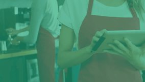 Barista scrolling tablet adjusting rotating brain hologram detail while colleague prepping espresso. Technology, innovation, collaboration, digital, education, futuristic, workplace - Powered by Shutterstock - Get 15% off with code: PIKWIZARD15