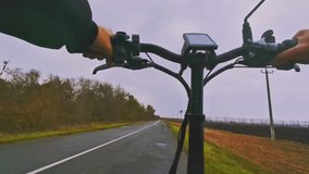 First-person view of an electric bike in the wild - Powered by Shutterstock - Get 15% off with code: PIKWIZARD15