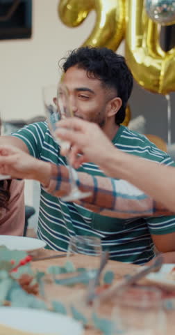 Hands, toast and celebration with champagne for friends, party and new years for reunion. People, group and cheers with alcohol for social gathering, wine and bonding together with holiday in house