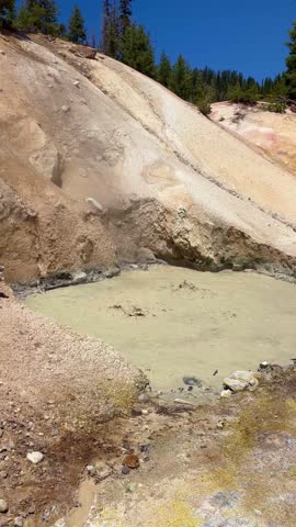 Lassen Volcanic National park, puddle of mud boiling due to volcanic activity near Sulphur works