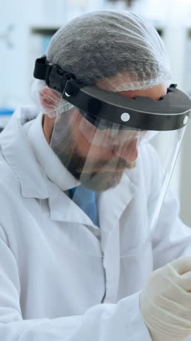 Lab, scientist and man with pipette, experiment and medical research for drug development or biotech. Pharmaceutical, cure and person with face shield for protection, test and process for medicine