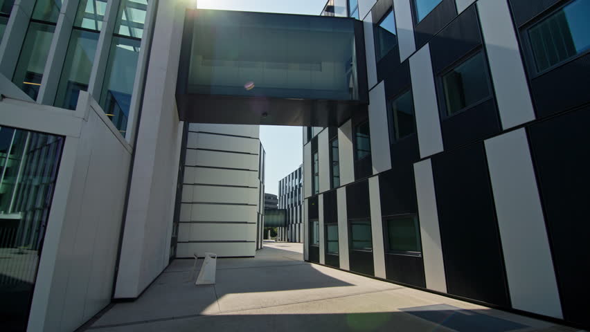Urban cityscape of modern district WU campus Vienna Austria. Beautiful glass buildings of library and university.