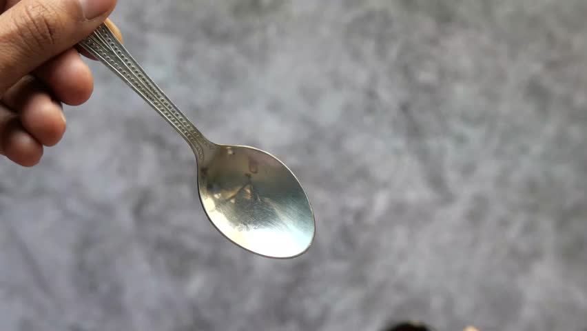 Measuring Medicine Dosage with a Spoon 4k