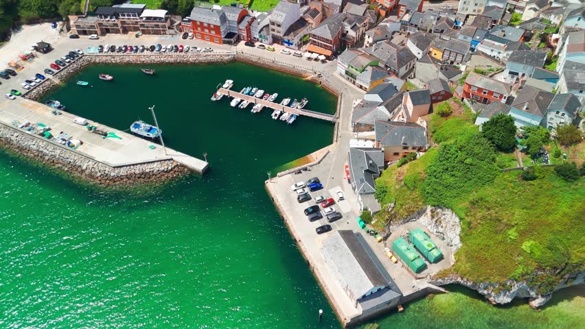 Aerial view of O Porto do Barqueiro, a picturesque fishing village and port in Manon, Ferrolterra, province of A Coruna, Galicia, Spain. Traditional coastal parish with maritime heritage.