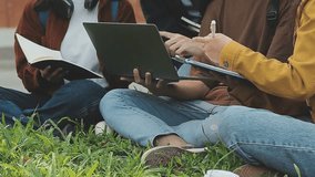 Young boy girl friends group high school students working together on laptop at Campus Garden. Education lifestyle. pupils gather University, college, prepare for final exams using computer. Book pen - Powered by Shutterstock - Get 15% off with code: PIKWIZARD15