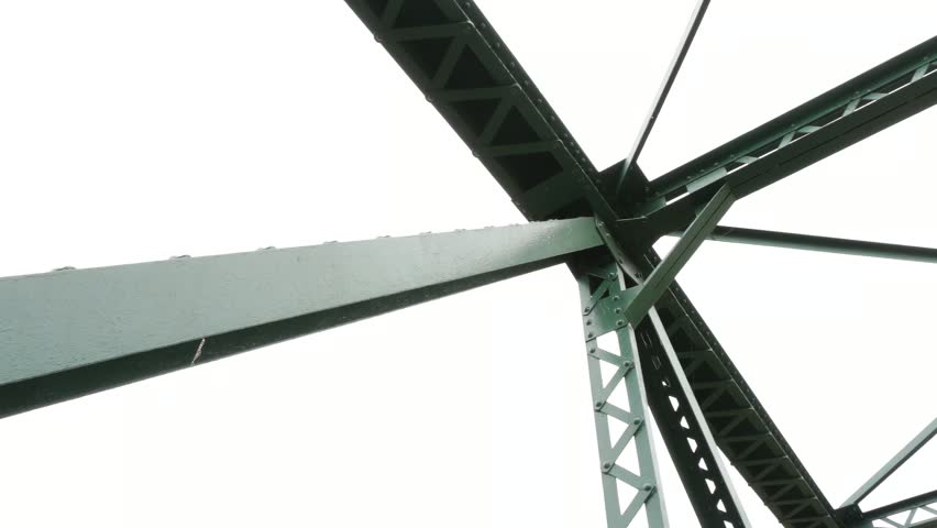 The iconic World War II Memorial Bridge (Saphan Khong) in Pai, Mae Hong Son, Thailand, a historic green steel truss bridge with a wooden deck, A popular tourist destination  of the region