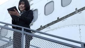 Professional female entrepreneur preparing for business trip at airport - Powered by Shutterstock - Get 15% off with code: PIKWIZARD15