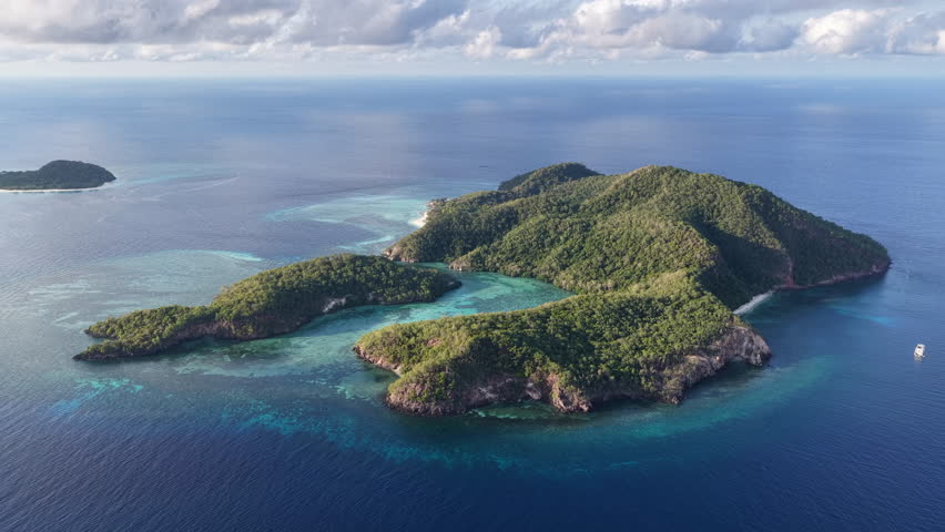 The beautiful island of Pulau Tellang, lies east of Alor, Indonesia. This area in the Banda Sea is known for its diverse coral reefs and spectacular scuba diving and snorkeling.