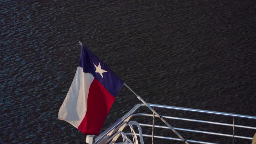 Texas Flag Waving on Boat above Lady Bird Lake in Austin 29