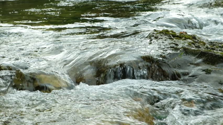 Turbulent Water Flow of Fast River, Slow Motion Nature Scene