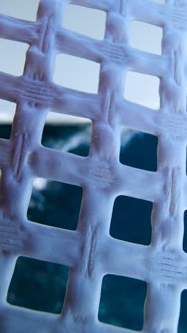 Sailing yacht trip.  Moments on a yacht. A trampoline on the bow of a sailing yacht, selective focus on the movement on the sea.