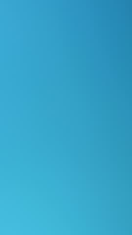 Man wearing blue latex gloves, closeup. Vertical footage