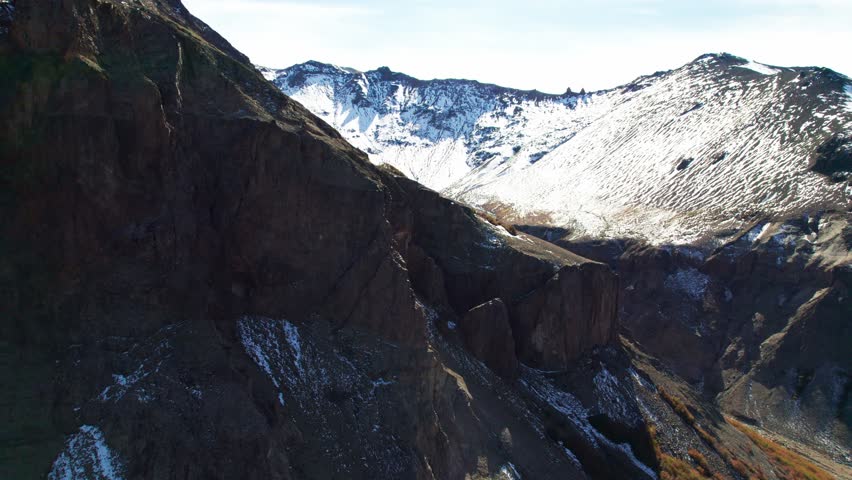 Aerial shot of mountains and snow