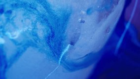Vertical video. Paint spill. Frost background. Defocused blue color sparkling droplets ice water floating on light acrylic cold abstraction. - Powered by Shutterstock - Get 15% off with code: PIKWIZARD15