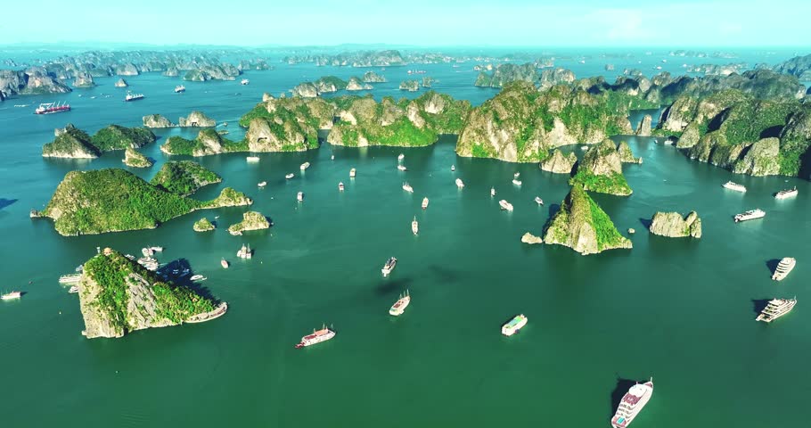 Aerial view of Scenic Halong Bay, Vietnam with boats amongst limestone islands. UNESCO World Heritage Site. Popular landmark, famous destination of Vietnam