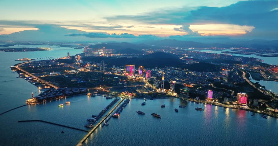 Aerial view of Ha Long city and rock island, Halong Bay, Vietnam, Southeast Asia. UNESCO World Heritage Site. Junk boat cruise to Ha Long Bay. Popular landmark, famous destination of Vietnam