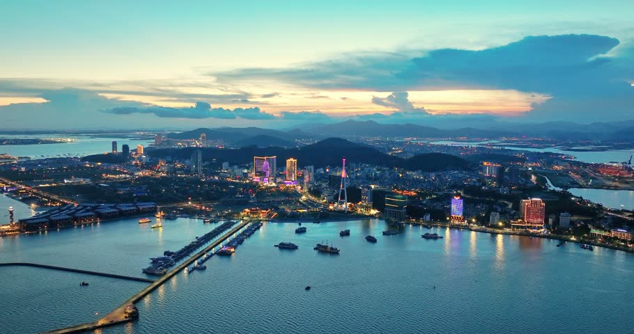 Aerial view of Ha Long city and rock island, Halong Bay, Vietnam, Southeast Asia. UNESCO World Heritage Site. Junk boat cruise to Ha Long Bay. Popular landmark, famous destination of Vietnam
