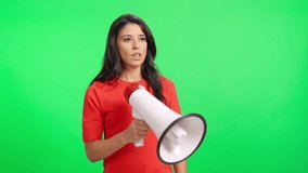 Woman protester shouting an announcement on a megaphone - Powered by Shutterstock - Get 15% off with code: PIKWIZARD15