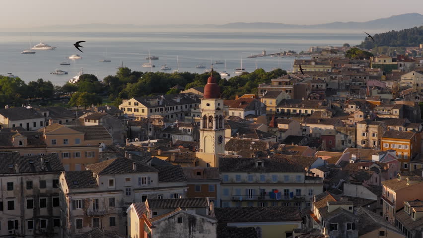 Slow panning drone shot of Saint Spyridon church in Corfu old town