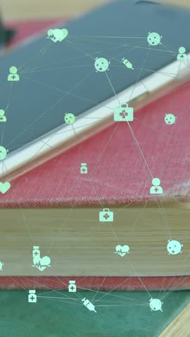 Animation of globe of digital icons over diary, coffee cup, glasses and smartphone on wooden table. Global networking and business technology concept