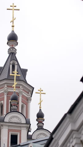 Golden crosses shining on russian orthodox church domes. Action