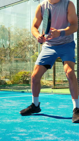 Padel tennis, man and outdoor court for game, fitness and training for match or challenge. Sports, competition and athlete person playing for low angle, workout or exercise at club for wellness