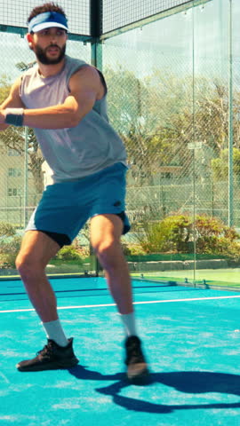 Padel tennis, person and outdoor court for game, fitness and training for match or challenge. Sports, competition and athlete man playing for low angle, workout or exercise at club for wellness