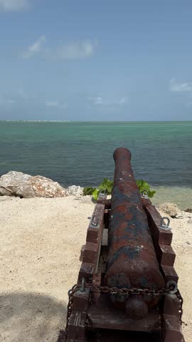 PAN SLOW MOTION SHOT - Historic cannons from wrecks of the 1733 Spanish Treasure Fleet on display at Whale Harbor in Islamorada, Florida, USA.