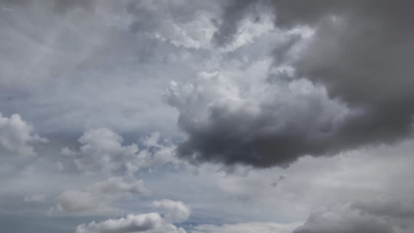 Dynamic and professional animation of various US tax forms, including Form 1040, W-2, W-9, 5498, and 1099-NEC, with prominent '2025' year indicators. The forms elegantly flow, overlap, and rotate across the screen, creating a compelling visual narrative. Ominous storm clouds background highlights the documents, representing trepidation and fear of outcomes. This visual effect is perfect for enhancing financial news segments, tax preparation service advertisements, corporate presentations, educational videos on tax regulations, or any content requiring a clean and informative representation of financial documentation for the current tax season.
