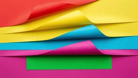Bright, colorful paper layers peel back to reveal a green screen! Use this dynamic transition for titles, logos, or fun video backgrounds. - Powered by Shutterstock - Get 15% off with code: PIKWIZARD15